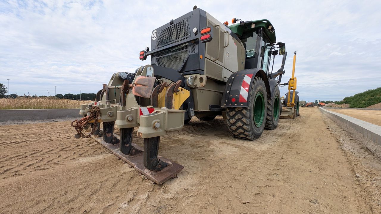 Mastering the First Impression: Your intriguing post title goes here Large construction equipment working on a road in Werlte, Germany, during daytime.